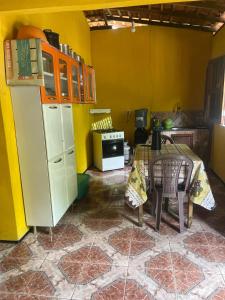 Kuchyň nebo kuchyňský kout v ubytování Nossa Casa Temporada