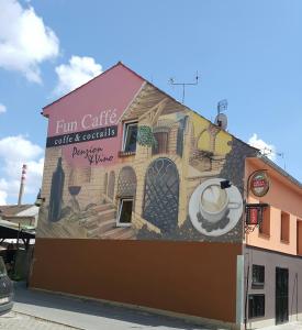 a mural on the side of a building at Penzion a Víno in Břeclav