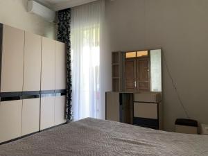 Postel nebo postele na pokoji v ubytování Guesthouse Achi