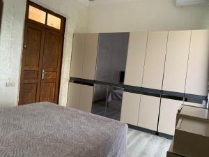 Postel nebo postele na pokoji v ubytování Guesthouse Achi