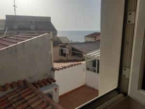 a view of a balcony with a view of the ocean at Da Massimo in Cefalù