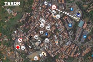 a map of a city with buildings and signs at Teror Centro 3 in Teror