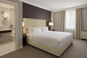 Ein Bett oder Betten in einem Zimmer der Unterkunft The Graham Georgetown