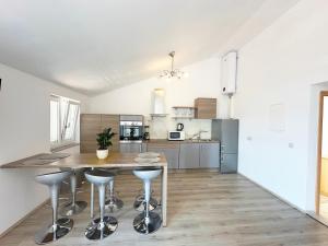 Kuchyň nebo kuchyňský kout v ubytování Apartments Rafael