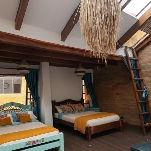 Postel nebo postele na pokoji v ubytování Usaquen Station Hostel