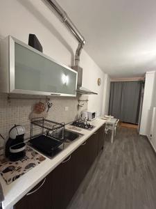 Η κουζίνα ή μικρή κουζίνα στο Nido Veronetta +4 φωτογραφίες