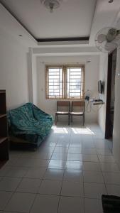 Μια τηλεόραση ή/και κέντρο ψυχαγωγίας στο Room Family Room Cengkareng