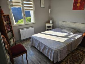 Ένα ή περισσότερα κρεβάτια σε δωμάτιο στο Gite entre loire et cosson