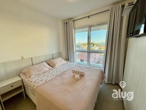 Postel nebo postele na pokoji v ubytování N10303 Vista Mar, Beto Carrero, Lazer e Diversão! + 75 fotografií