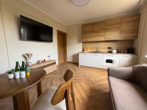 Η κουζίνα ή μικρή κουζίνα στο Apartamenty Uchnasta
