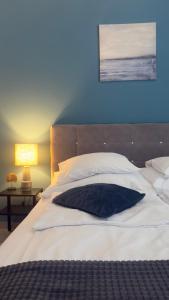 Een bed of bedden in een kamer bij Code Srebrno Jezero