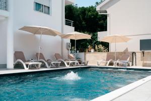 Πισίνα στο ή κοντά στο Hotel Ajana