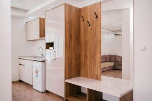 Η κουζίνα ή μικρή κουζίνα στο Hotel Ajana