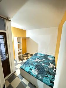 Postel nebo postele na pokoji v ubytování Appartement paisible en colocation