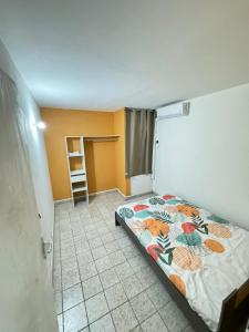 Postel nebo postele na pokoji v ubytování Appartement paisible en colocation