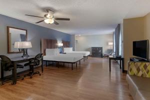 a large living room with a bed and a desk at Extended Stay America Suites - Washington, DC - Alexandria - Landmark in Alexandria