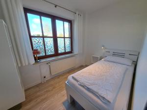 Katil atau katil-katil dalam bilik di Ferienwohnung Ilka
