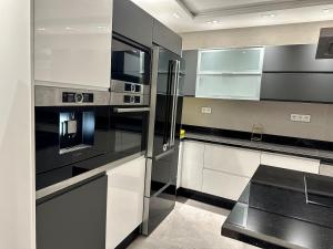 Kuchyň nebo kuchyňský kout v ubytování Royalty Penthouse Heritage VIP