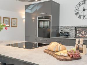 Kuchyň nebo kuchyňský kout v ubytování Bay Cottage + 12 fotografií