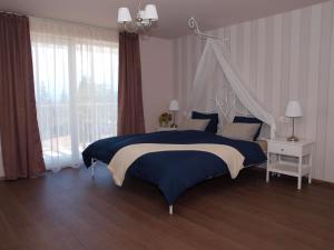 Postel nebo postele na pokoji v ubytování Guesthouse Olei