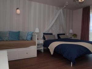 Postel nebo postele na pokoji v ubytování Guesthouse Olei