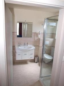 Vannituba majutusasutuses Guesthouse Olei +37 fotot