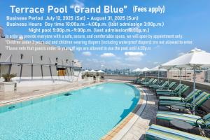 a pool with chairs and umbrellas on top of a building at Grand Nikko Tokyo Daiba in Tokyo +37 photos