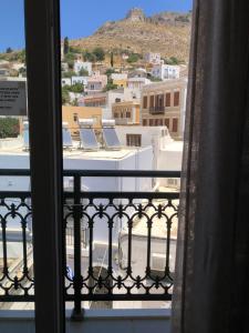A balcony or terrace at Platanos Rooms