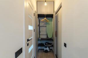 Koupelna v ubytování Petrovdom Apartments 10-68B in RC Manhattan, Beresteiskyi 11 + 25 fotografií