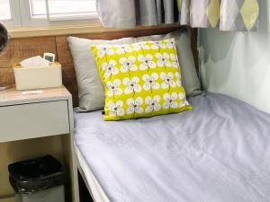 Voodi või voodid majutusasutuse AMU Dreamhouse 阿木旅舍 toas