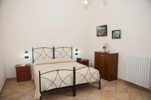 Postel nebo postele na pokoji v ubytování Agriturismo da Regina