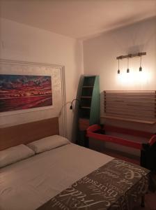 Postel nebo postele na pokoji v ubytování Relais Frantoio delle Pietre