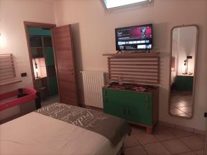 Postel nebo postele na pokoji v ubytování Relais Frantoio delle Pietre
