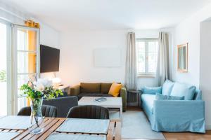 a living room with a couch and a table at Chata Achát in Turany nad Ondavou