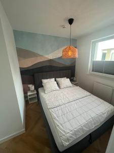 Ένα ή περισσότερα κρεβάτια σε δωμάτιο στο Apartament 46 Solemare