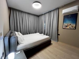 Katil atau katil-katil dalam bilik di STAY Mouson View Apartment