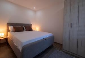 Ένα ή περισσότερα κρεβάτια σε δωμάτιο στο Nika house +5 φωτογραφίες