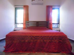 Postel nebo postele na pokoji v ubytování L'AZUR Studio Cottage 2, Vagator Beach GOA