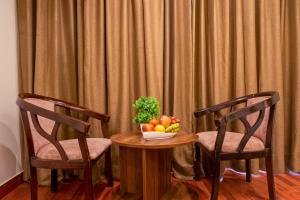 Posezení v ubytování Sandoz Palm Retreat - Mall Road, Mussoorie
