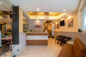 Posezení v ubytování Sandoz Palm Retreat - Mall Road, Mussoorie