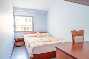 Voodi või voodid majutusasutuse Hotel R toas