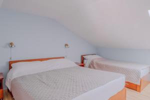 Voodi või voodid majutusasutuse Hotel R toas