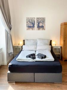 Katil atau katil-katil dalam bilik di Business Central Apartment Wiesbaden