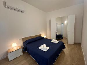 Ένα ή περισσότερα κρεβάτια σε δωμάτιο στο Casa Calipso