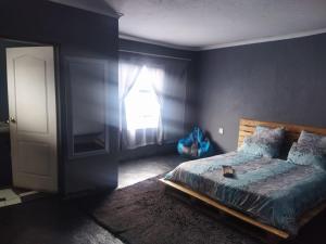 Katil atau katil-katil dalam bilik di Dobsonville Motel
