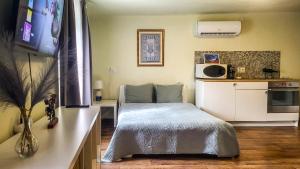 Kuchyňa alebo kuchynka v ubytovaní Mi Casa Vendégház - Apartments