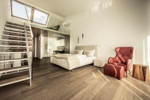 Katil atau katil-katil dalam bilik di MALAT Weingut und Hotel