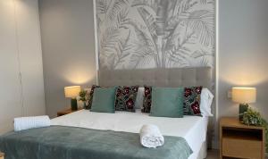 Ένα ή περισσότερα κρεβάτια σε δωμάτιο στο Sueños del Mediterraneo 755 +46 φωτογραφίες