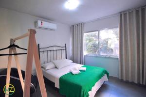 Una cama o camas en una habitación de Apartamento de 3 cuartos para 8 personas en Copa