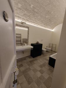 Koupelna v ubytování La casa del tempo + 42 fotografií